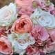 Coral rose, blush rose and pink hydrangea wedding bouquet made of silk roses.