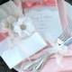 VINTAGE GLAMOUR: Coral and Blush Elegant Lace Pocketfold Wedding Invitation, Satin Ribbon Invitation, Feather Flower Invitation