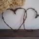 Entwined rusty barbed wire hearts home wedding decor