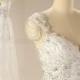Ivory Luxury Sleeveless Lace Applique Chapel Train Wedding Dress Ball Gown Sheath/Column Bridal Gown With Beaded motif