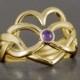 Heart infinity puzzle ring in solid gold with natural amethyst cabochon