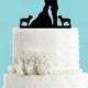 Couple Kissing with Two Boston Terriers Wedding Cake Topper