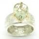 Drop shape green amethyst ring set in gold with hammered silver
