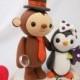 Custom Wedding Cake Topper--Monkey and Penguin Love with Wedding Ring and circle clear base