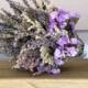 Simple dried flower bridal bouquet with dried Lavender, Caspia and Statice. Wrapped with lace.