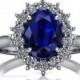 The Duchess: 1.2ct Oval Royal Blue Sapphire & Diamond Cluster Ring set on 18K White Gold