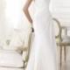 Elegant V-neck Draped Wedding Dress with Semi-sheer Back Flared Skirt