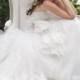 Dropped Waist Strapless Ball Gown Wedding Dress with Layered Skirt and Draped Bodice
