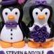 A penguin couple wedding cake topper. / Purple roses