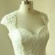 Vintage fit and flare lace wedding dress with keyhole back and capsleevs