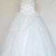 Romantic Ivory ball gown wedding dress with elegant beading work