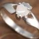 Real Irish Opal Claddagh Ring, Sterling silver ladies claddagh with a beautiful opal gem.
