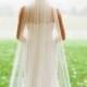Cathedral, fingertip, elbow, shoulder wedding veil, **108 in. wide** white to ivory, cut edge, one tier with clip