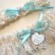 Aqua / Robin's Egg Blue Wedding Garter Set Personalized in Ivory Venise Lace with Engraving, a Bow and Rhinestones