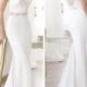 Elegant Short Sleeves Plunging V-neck Mermaid Illusion Back Wedding Dress Featuring Crystal