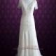 Ivory Bohemian Wedding Dress with Silk Lining Cap Sleeves and Intricate Beading 