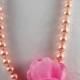 Pink pearls neaklace with silk flower