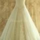 Strapless ivory tulle lace wedding dress, ball gown with sweetheart neckline