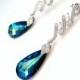wedding bridal swarovski bermuda blue crystal teardrop cubic zirconia on luxury curvy cz post earrings