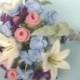 Felt flower wedding bouquet with purple, white, pink, and blue wool flowers. Ideal as spring wedding flowers or winter bridal bouquet