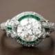 Rare and Pristine Art Deco Engagement Ring - Emerald and Diamond Halo - Bow Motif. Circa 1925
