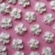 White royal icing flowers with pink pearl centers  -- cake decorations cupcake toppers edible (24 pieces)