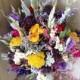 Colorful dried flower bridal bouquet. Perfect for your garden wedding.