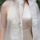 Juliet cap bohemian bride veil with feather like ivory beaded lace surrounding "Kate"