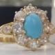 A Stunning Halo of 1.15 Carats of Plump Old European Diamonds Surrounds A Pretty Cabochon Turquoise. Statement Vintage Engagement Ring.