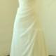 Ivory fit and flare chiffon wedding dress with chapel train