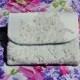 Repurposed/upcycled wedding dress made into a Swoon Dakota Tablet Clutch