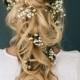 Romantic Tousled Bridal Braid Adorned With Baby's Breath