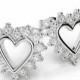 Diamond Heart Stud Earrings by Raven Fine Jewelers