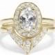 Oval Shaped Diamond Engagement Ring with Matching Side Diamond Band - The 3rd Eye