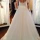 H1682 Beautiful illusion lace bateau neck long sleeved ball gown wedding dress