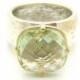 Green amethyst ring set in gold and  a hammered silver