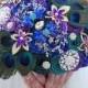 BROOCH BOUQUET peacock design. Jewled purple and emerald broach boquet with silver and gold gems
