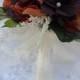 wedding bouquet in piones mocca brown and orchiids brown