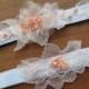 Whimsical White and Peach Wedding Garter set- Bridal keepsake, toss away garter w/ peach pink lace floral appliques, crystals and pearls