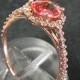 Orange Pink Padparadschah Sapphire 6mm .78 carats in 14K Rose gold Diamond Halo ring  1161