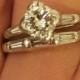 Vintage platinum and diamond wedding band engagement ring set. Center stone is one carat.
