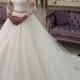 H1578 Classy long sleeved tulle ball gown wedding dress with belt