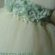 Ivory flower girl dress with mint green chiffon flowers. Tutu flower girl dress