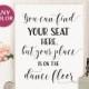 You can find your seat here but your place is on the dance floor sign Wedding signage printable Reception seating Wedding sign calligraphy