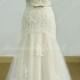 Open back Fit and flare tulle lace wedding dress with scallop neckline and champagne lining