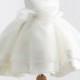 Beautiful White or Ivory Satin Girls Gown with a jewel neckline and a Big Bow