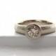 Recycled white gold and Champagne diamond bezel set  solitaire low profile engagement ring with wide hammered band