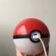 Hand-made Pokeball Themed Battery Pack / Phone Charger / Power bank (attaches to belt loop or backpack with a keychain clasp)