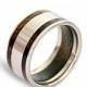 Titanium mens ring with oak wood inner inlay and inlaid with cocobolo wood on two sides