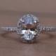 Rose gold engagement ring. Peach sapphire diamond ring. 14k rose gold oval sapphire ring. Engagement rings by Eidelprecious.